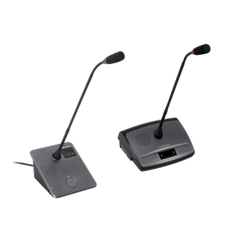 Two ATUC-50 Digital Discussion System tabletop units, each featuring a slim gooseneck microphone and a rectangular base, are positioned side by side on a plain white background.