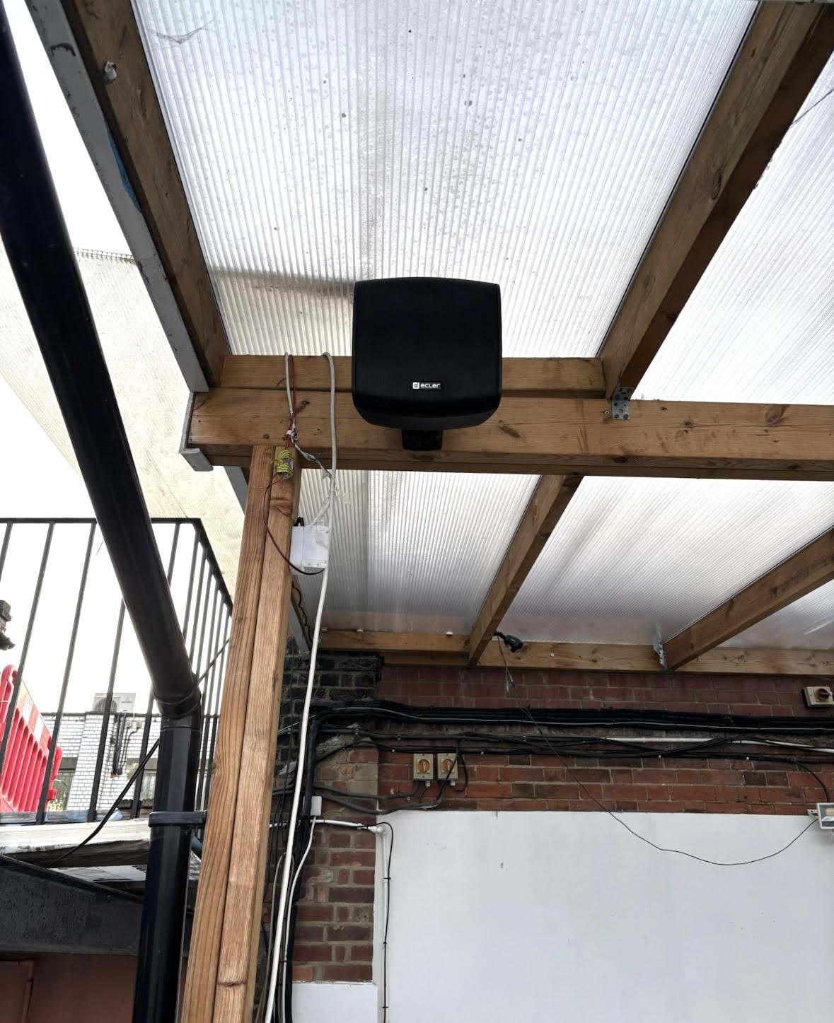 Ceiling-mounted outdoor speaker under the mosque roof Outdoor speaker installed under the roof of EMCA Mosque for audio broadcasting
